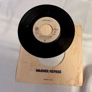 Warner Bros. Black Vinyl Record with Beige‎ Label
